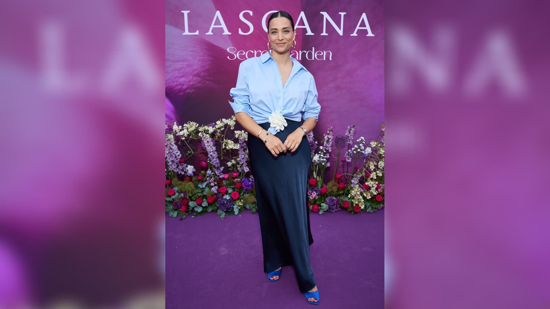 Amira Aly is happy that she no longer has to hide her belly. It's her first public appearance since announcing her renewed pregnancy.