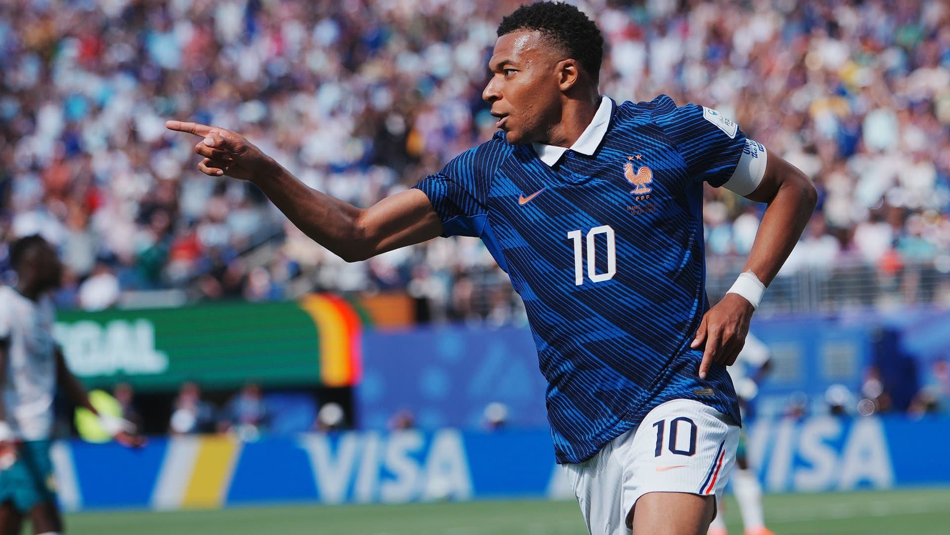 French superstar Kylian Mbappé celebrates a goal in the match against Senegal.