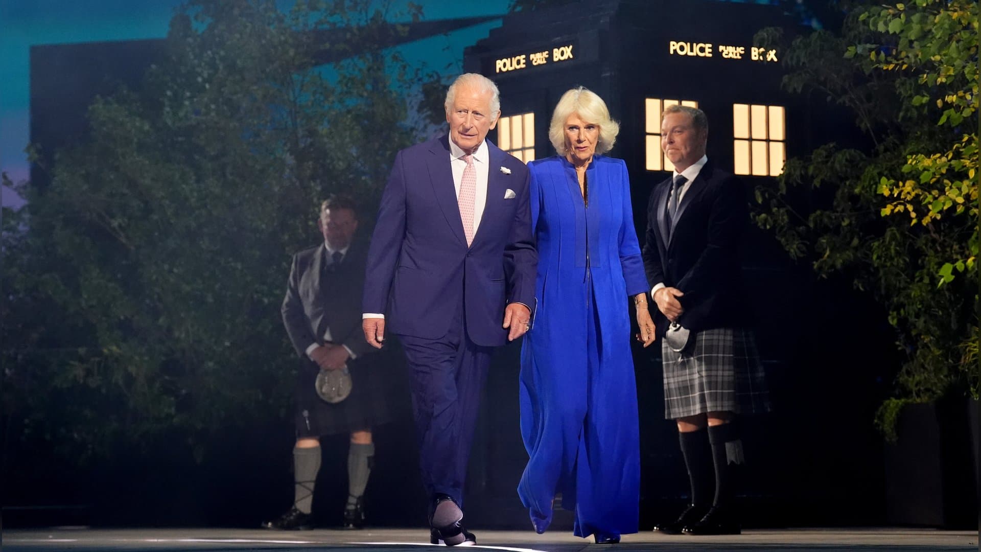 King Charles III and Queen Camilla at the opening of the Commonwealth Games. The TARDIS can be seen in the background.
