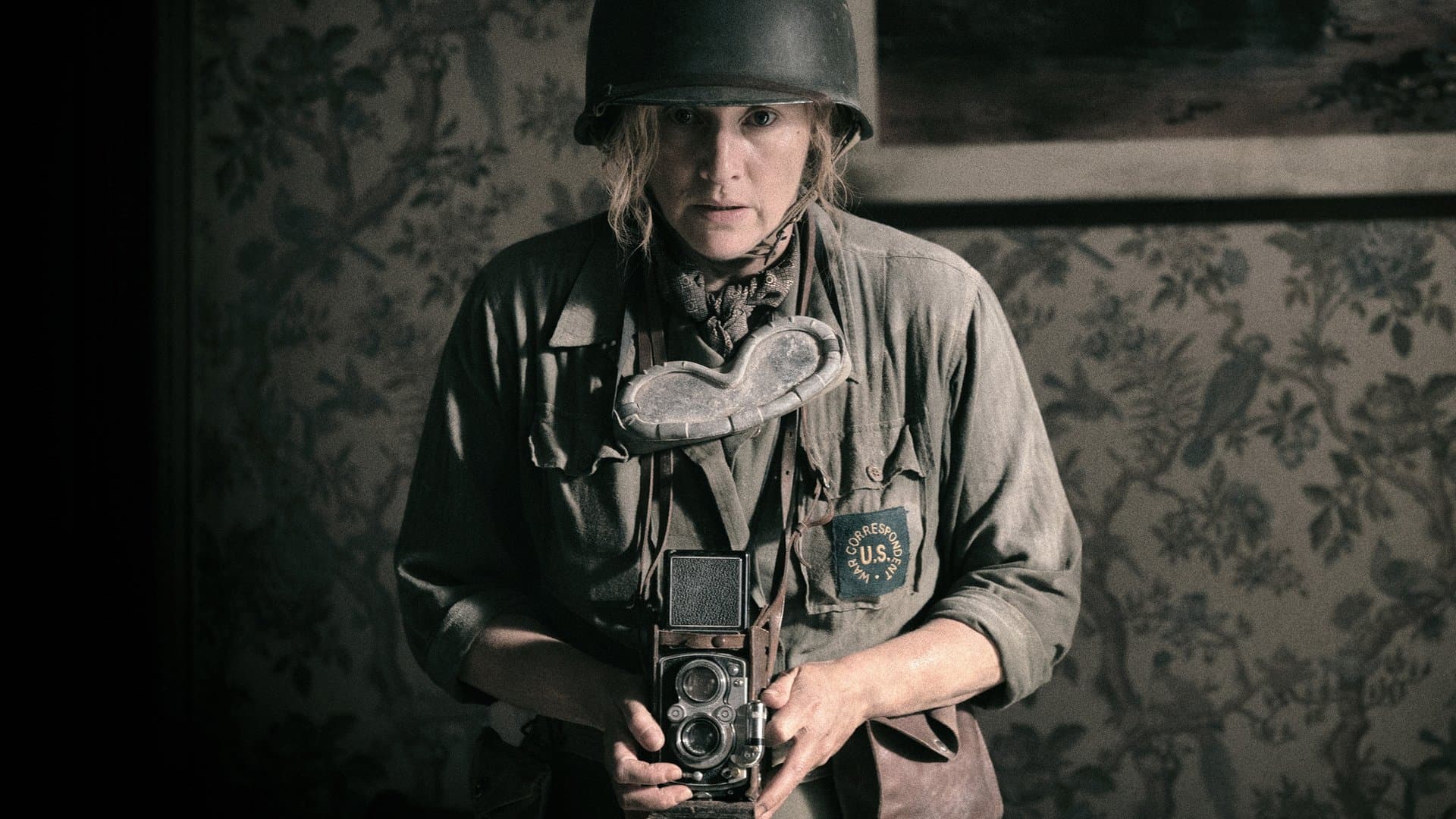 Photographer Lee Miller (Kate Winslet) captures the horrors of war with her camera from the closest proximity.