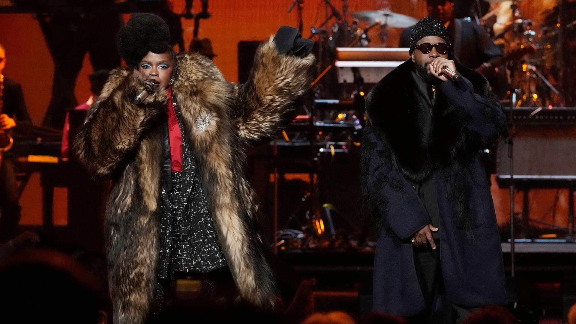 Lauryn Hill and Wyclef Jean on stage.