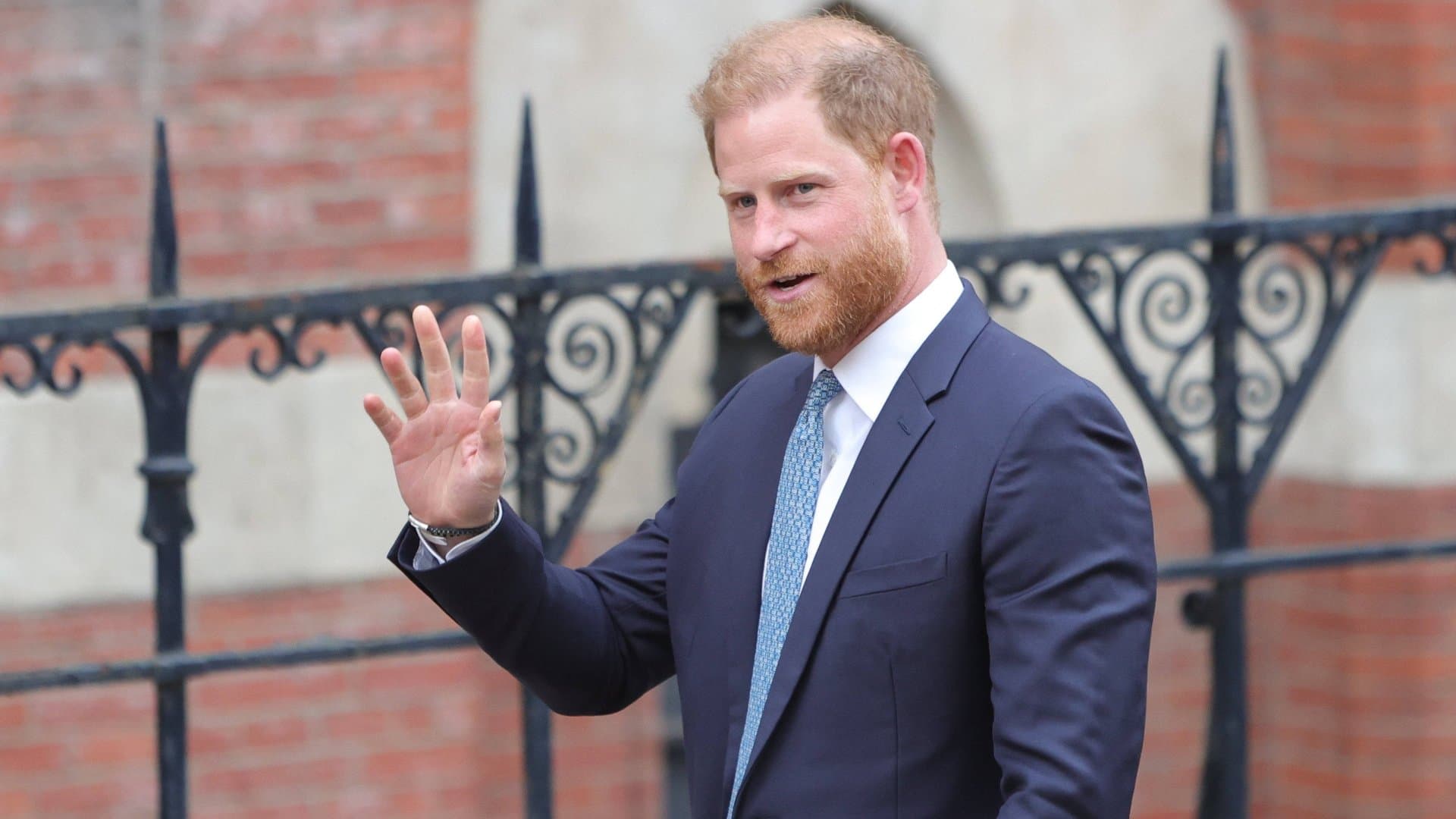 Whether Prince Harry travels to England with his wife and two children depends on the longstanding security issue.