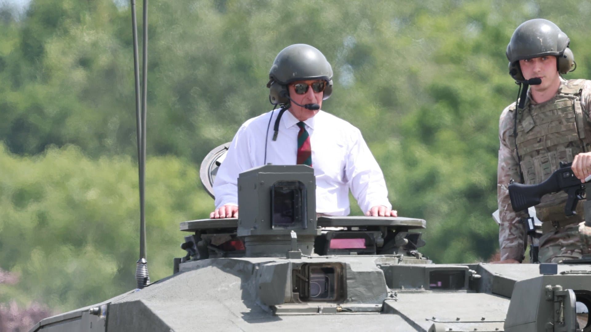 King Charles in a battle tank.