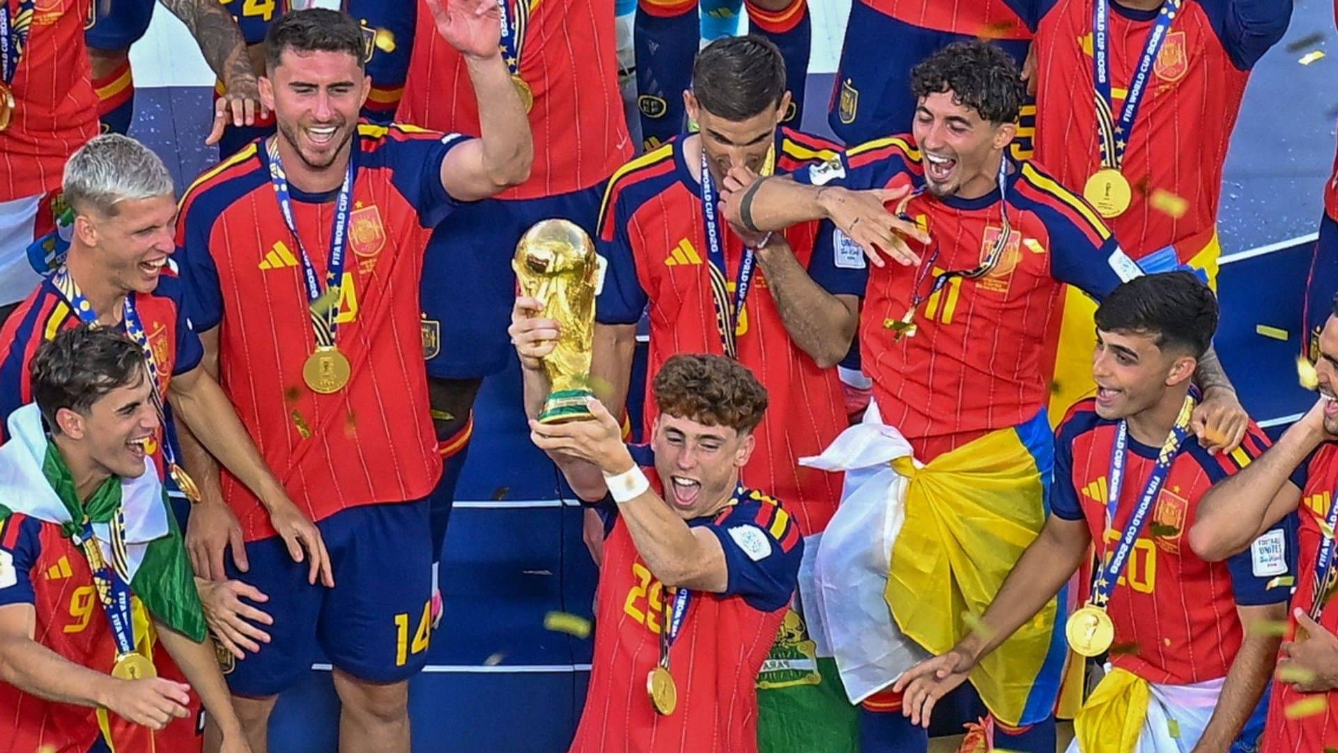 There's the trophy: The Spanish celebrate their second World Cup victory after 2010.