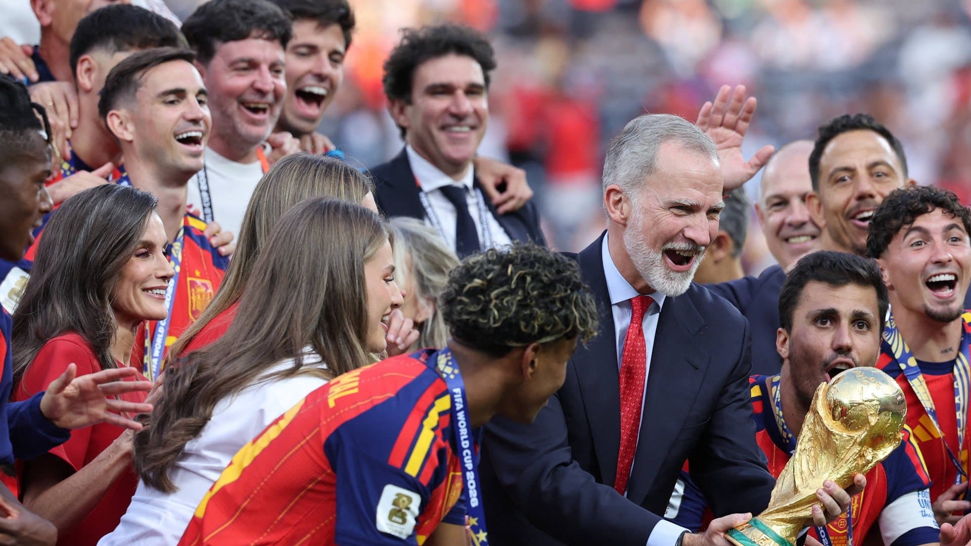Shared joy: The royal family mingled with the Spanish team after the match.