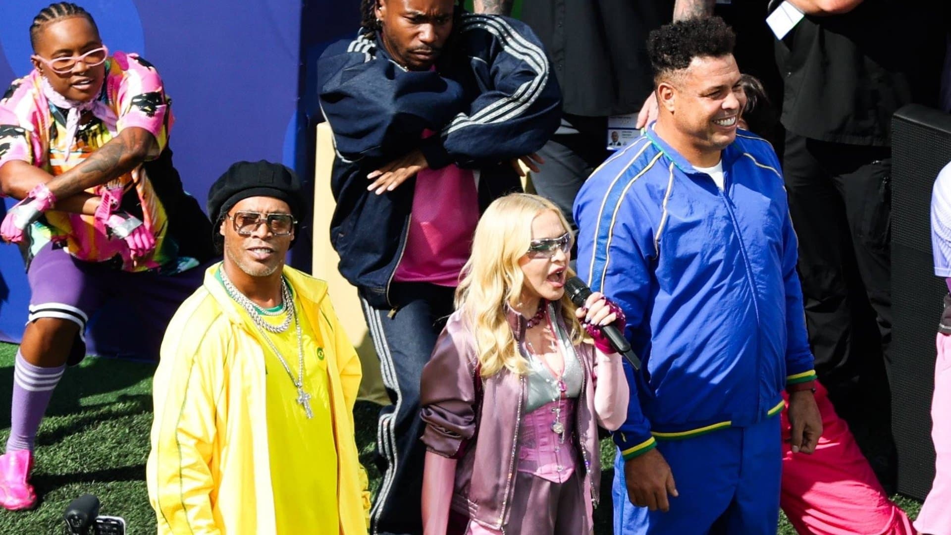 Madonna sang hand in hand with Brazilian legends Ronaldinho and Ronaldo.